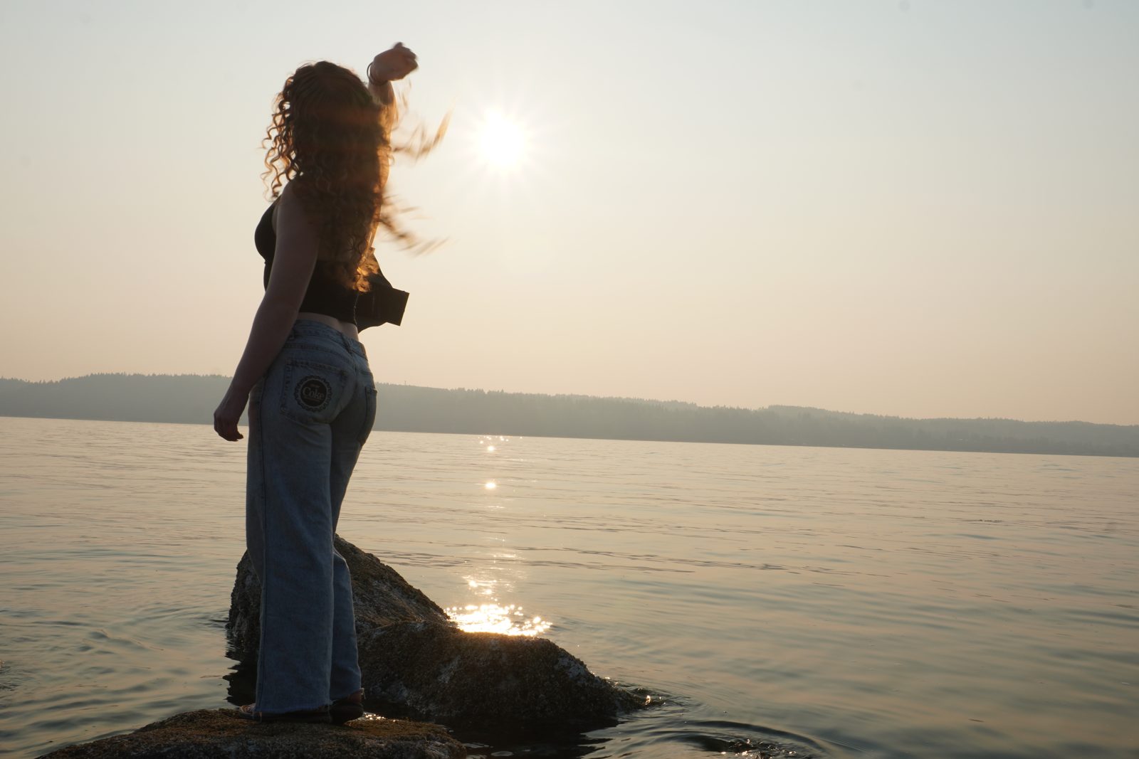 Golden hour silhouette on the lakeshore